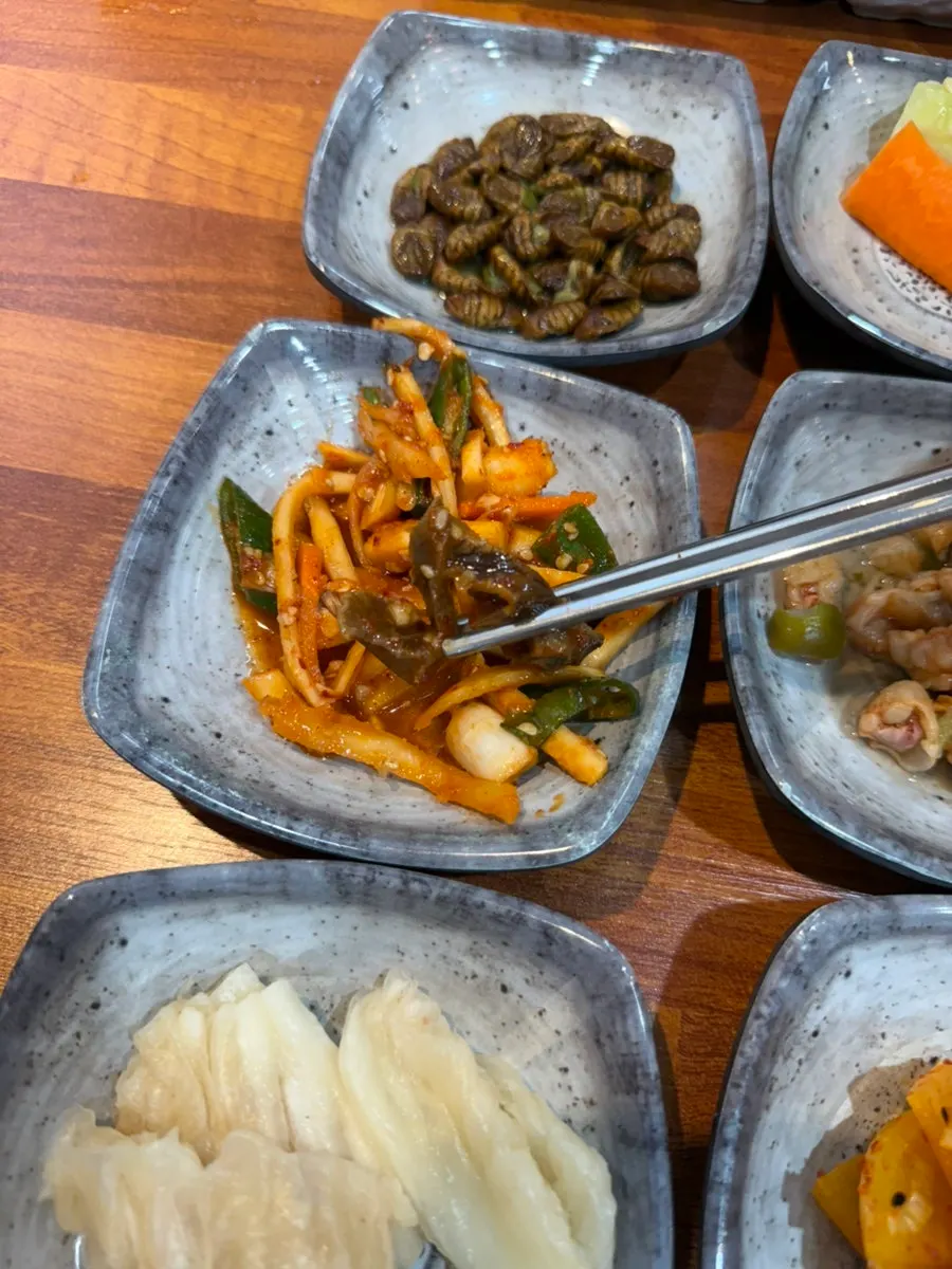 Acorn jelly side dish topped with seasoning sauce