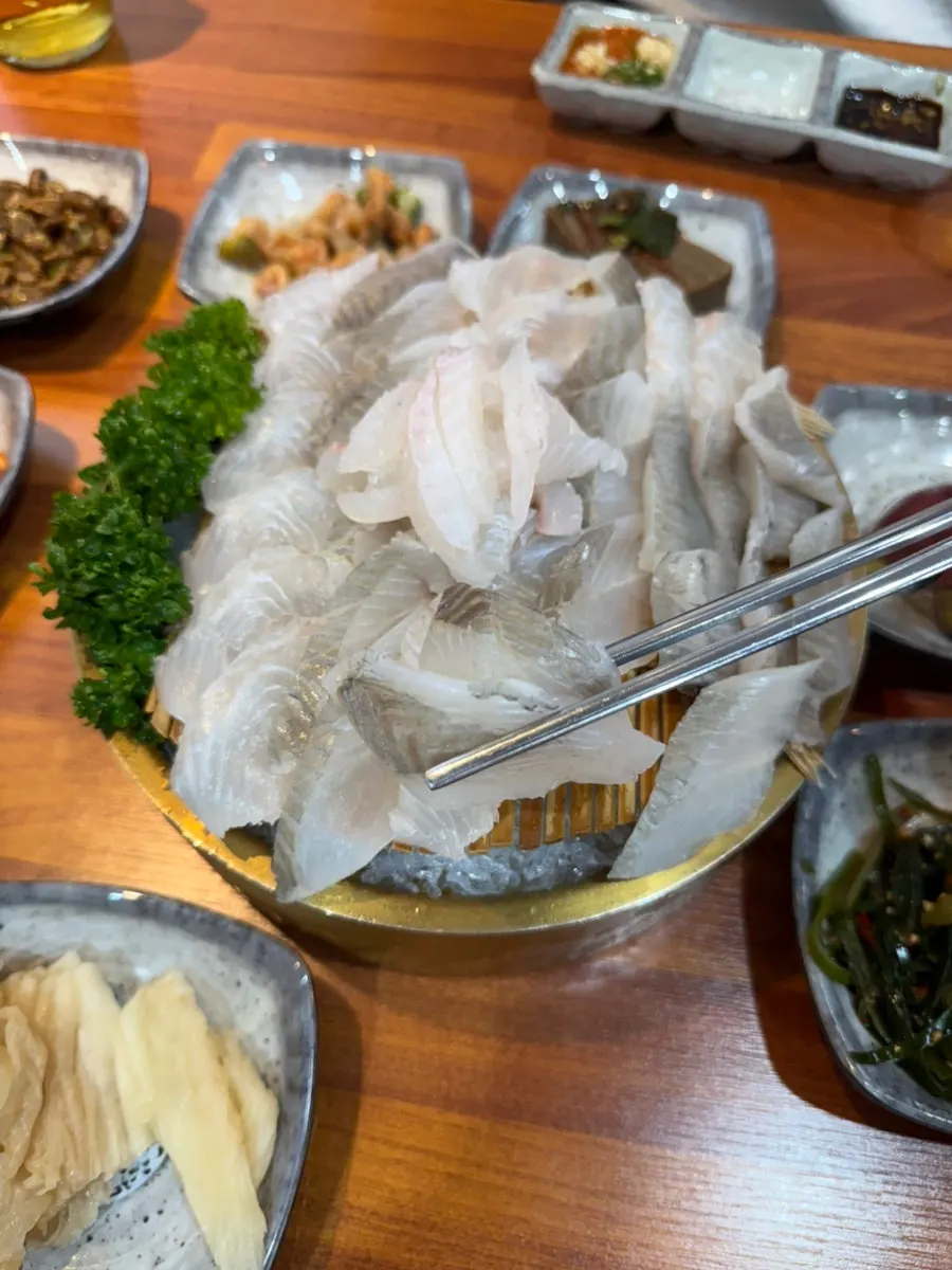 Close-up of glossy assorted sashimi platter