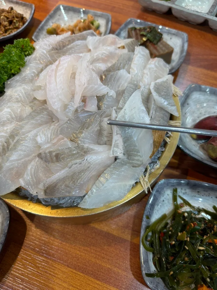 Cross-section of assorted sashimi with several fish types