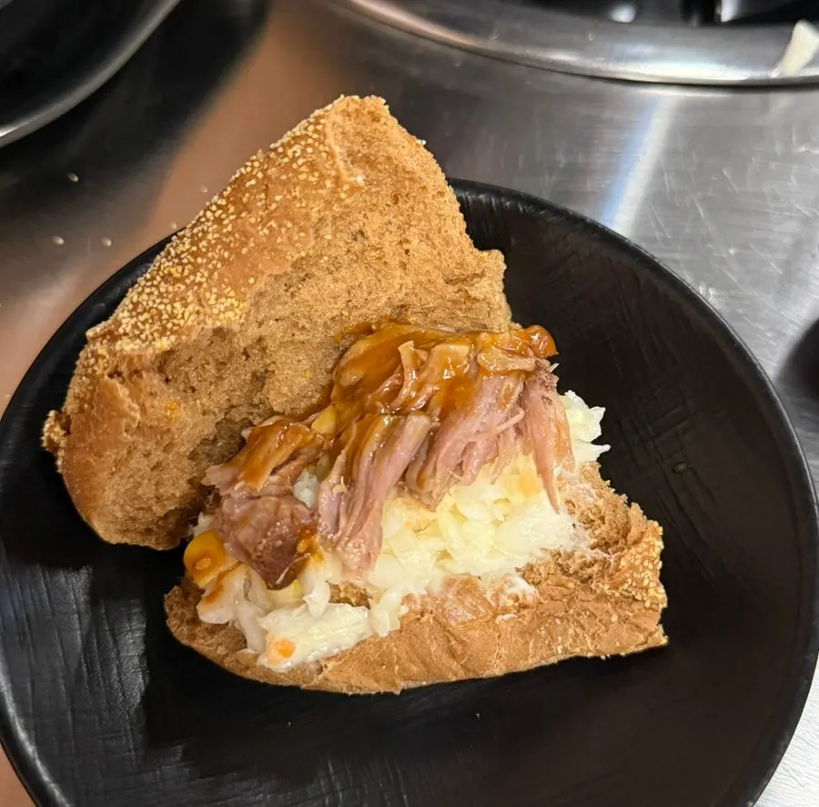 Tender bone grill meat pulled apart with chopsticks
