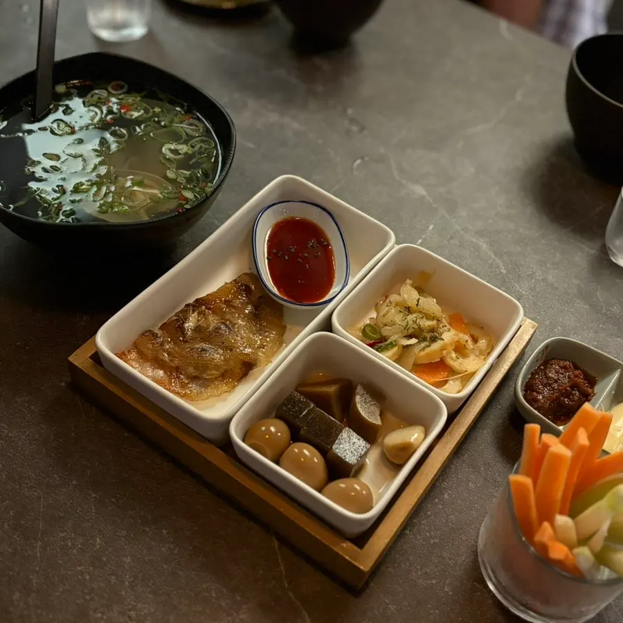 Complimentary clam soup at Dari Yeodeolgae