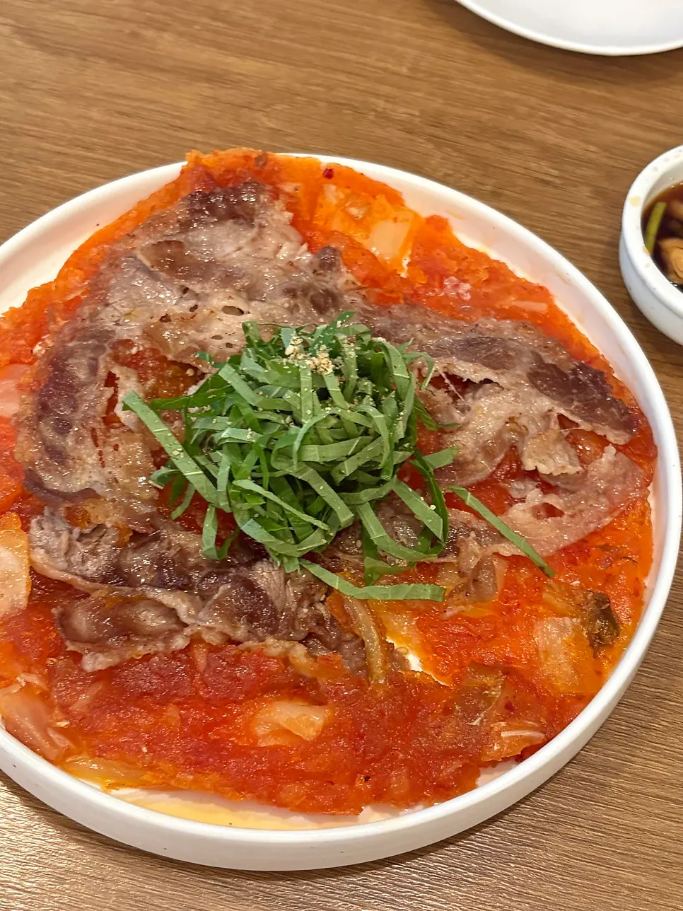 A full plate of Susu Yeonnam's chewy beef brisket kimchi jeon