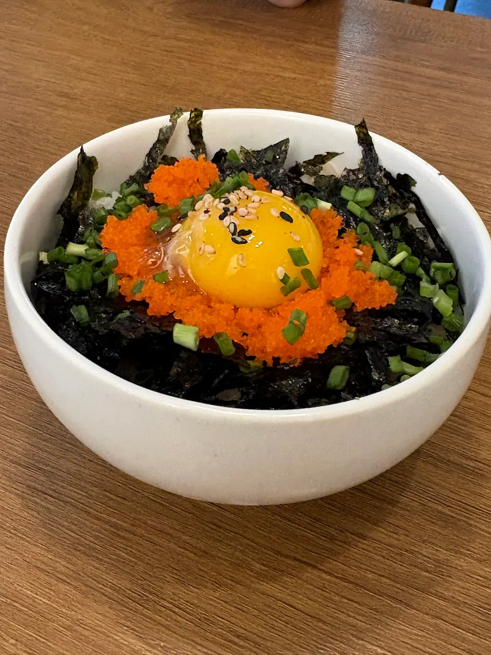 Close-up of the flying fish roe on top of the sorghum rice