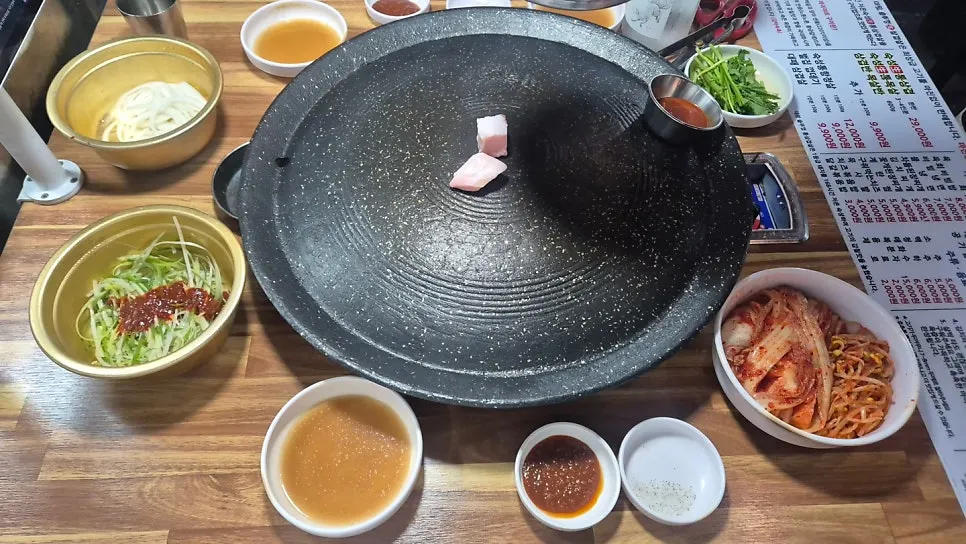 Spacious restaurant interior with generous table spacing