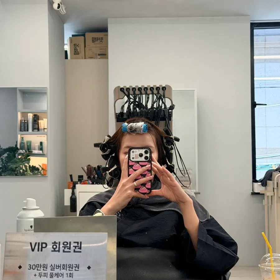 Heat-perm process with C-curls and S-curls set in rollers