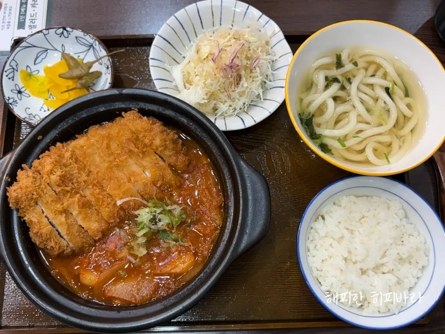Kimchi katsu nabe set served bubbling in an earthenware pot
