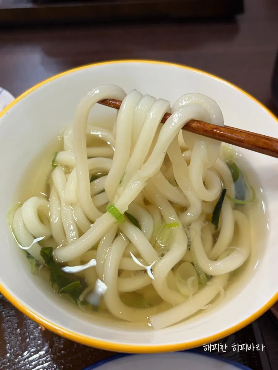 A spoonful of the mini udon broth