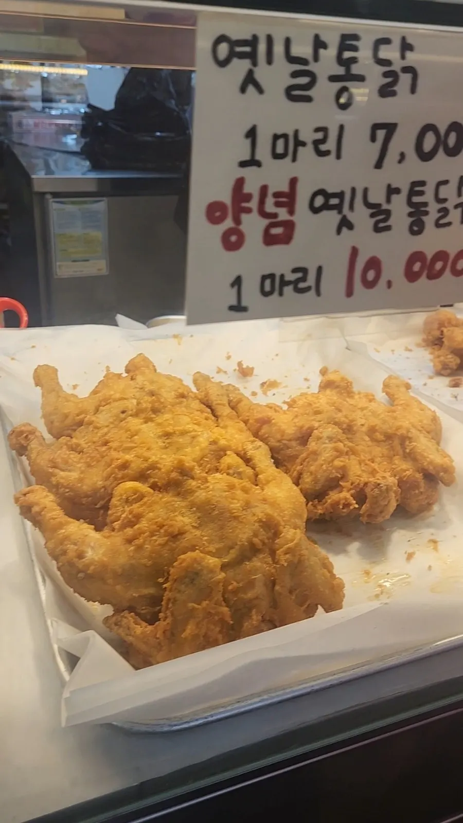 Sign for by-part sales of wings, drumsticks, and more