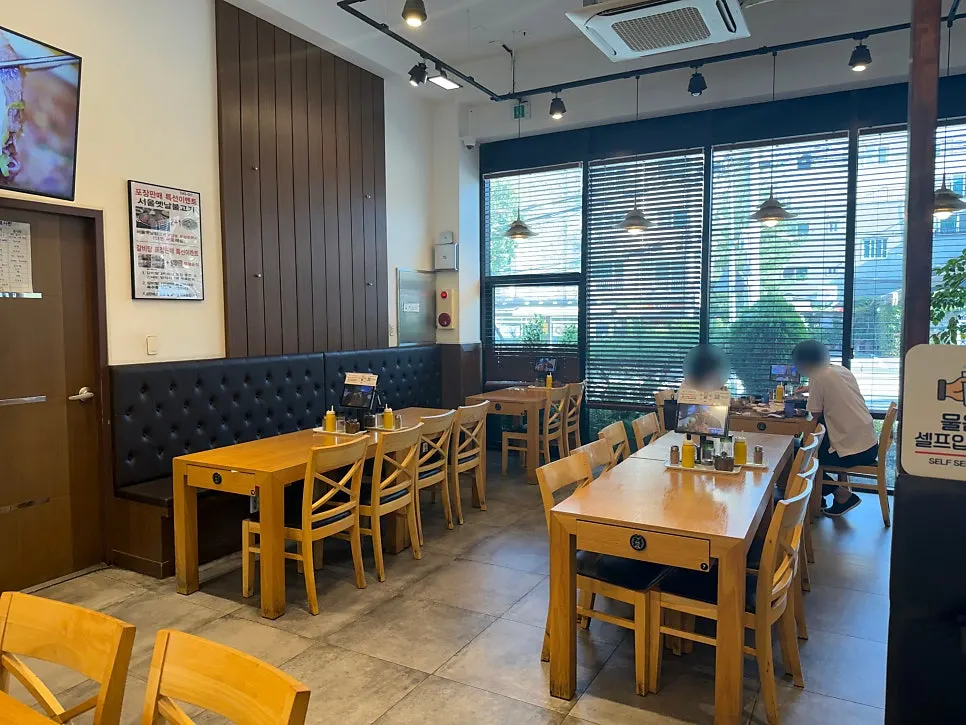 Wood-toned interior at Iseol Myeonok Suyu Main Branch