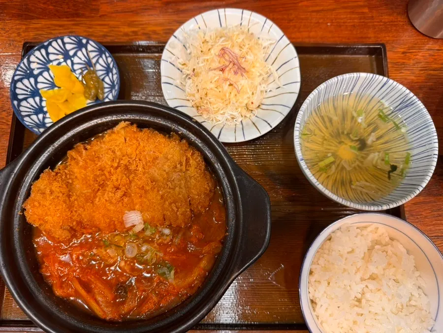Full table setting with kimchi katsu nabe