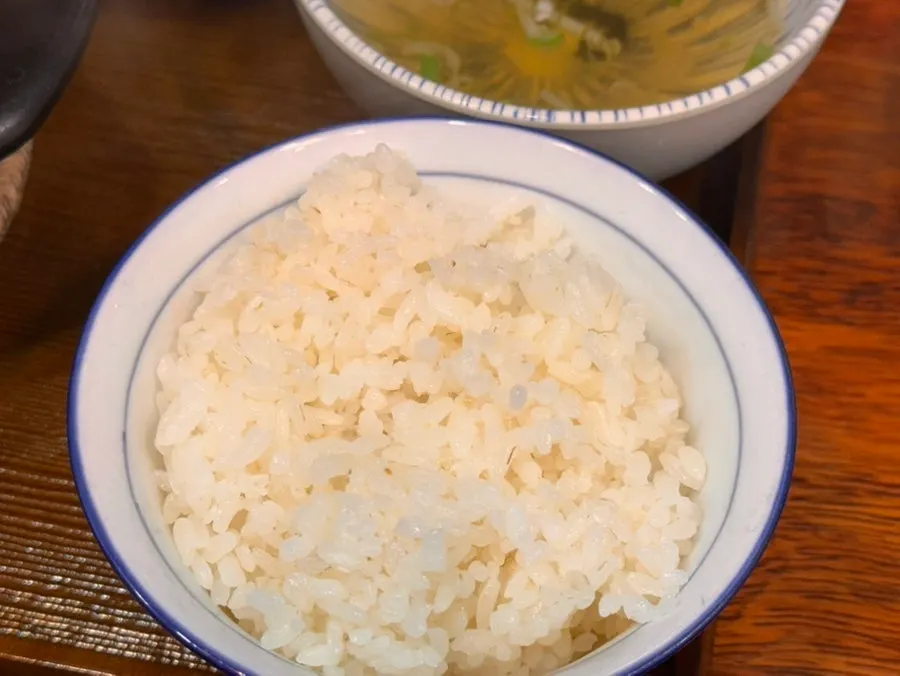 A spoonful of the spicy kimchi katsu nabe broth