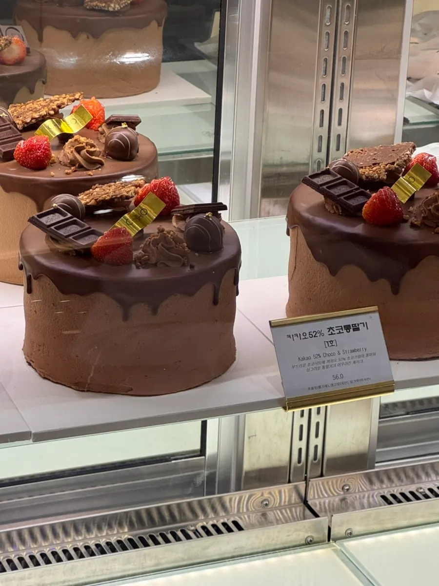 Cake topped with pistachio cream and figs