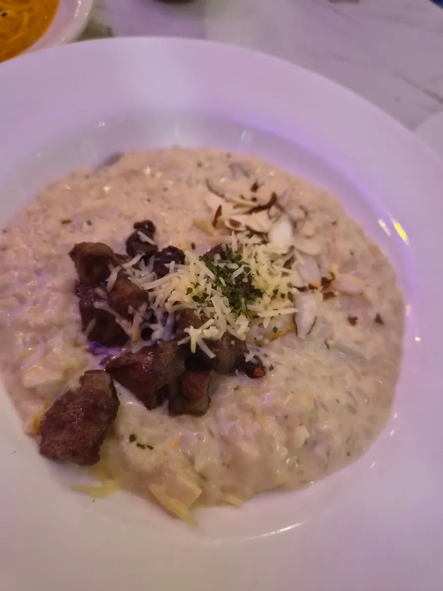 A plate of Table d'Hote's beef risotto