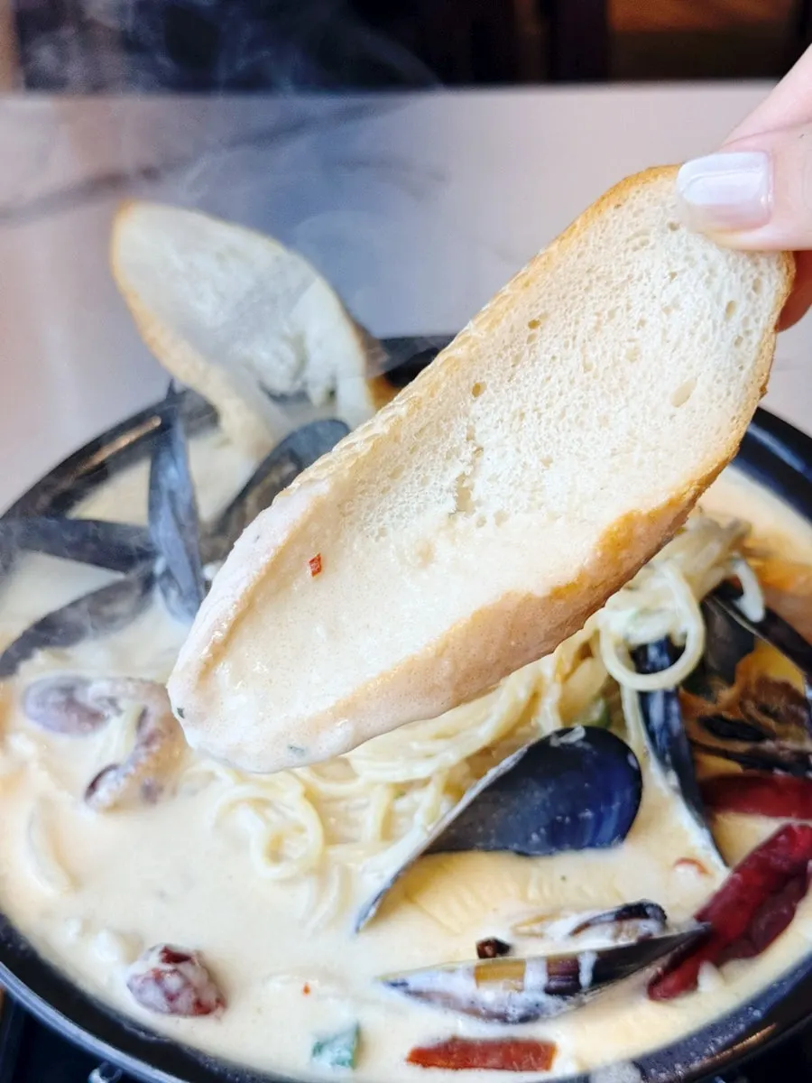 Toasted bread dipped in cream sauce
