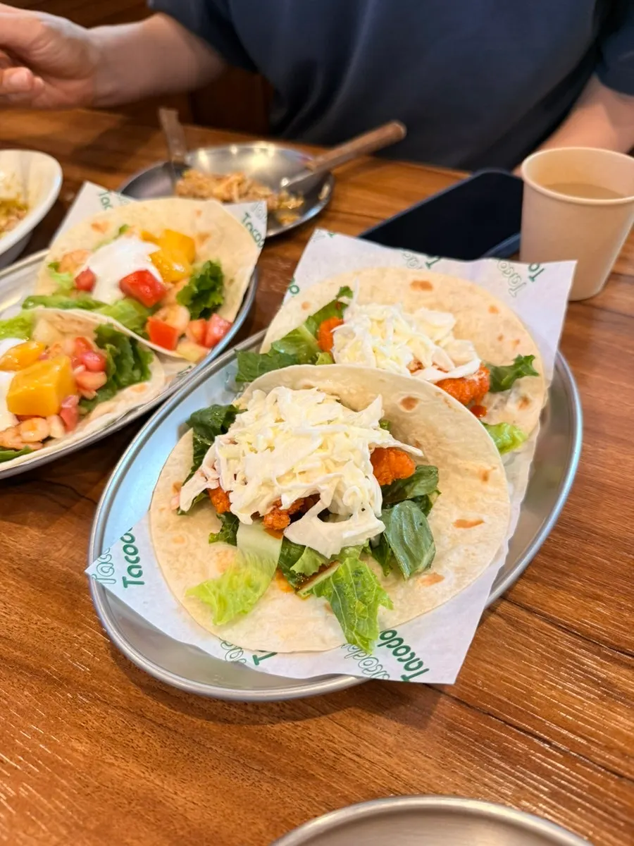 Juice dripping from the mango shrimp taco