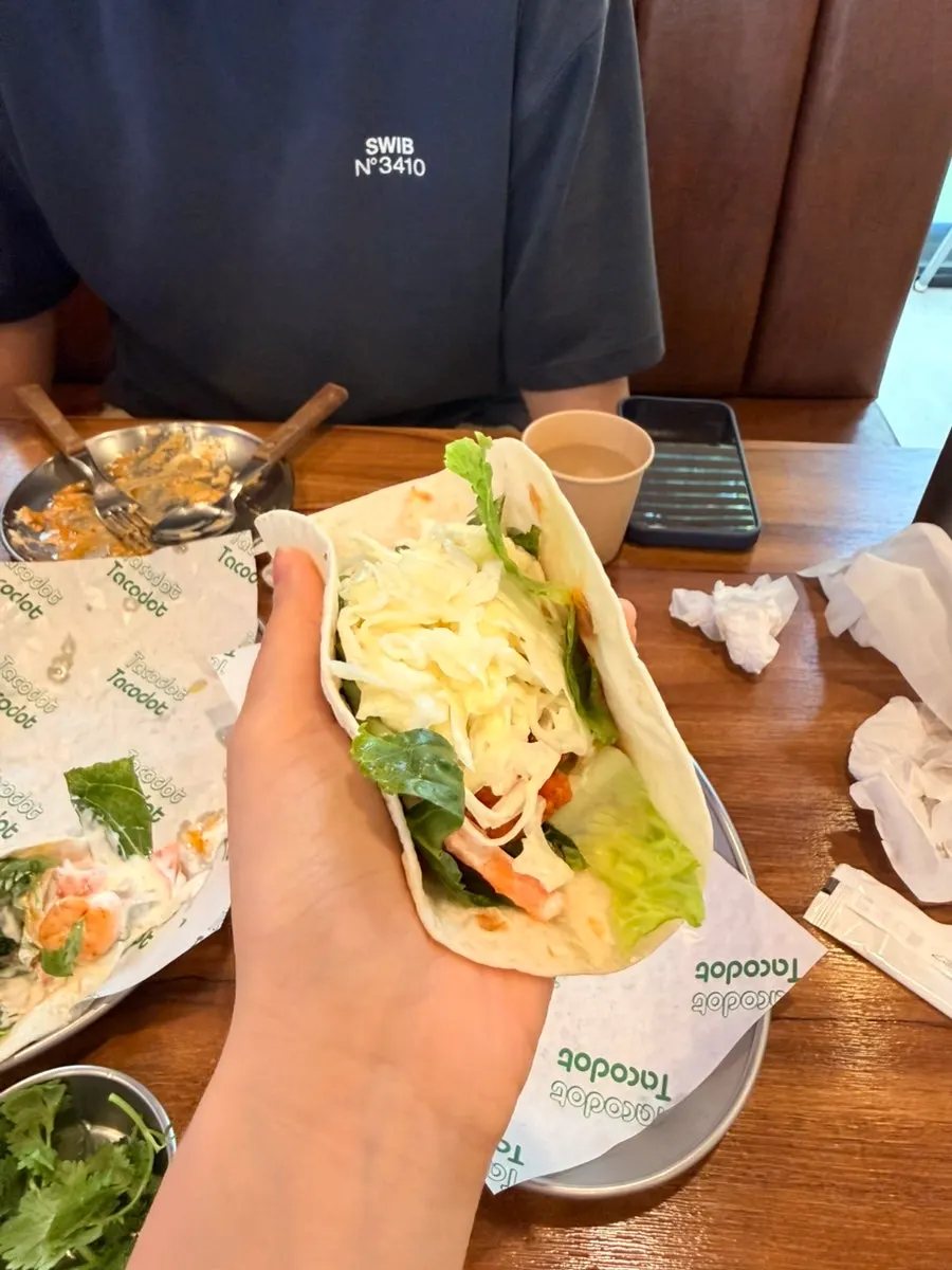 Nashville hot chicken taco with coleslaw and chipotle mayo
