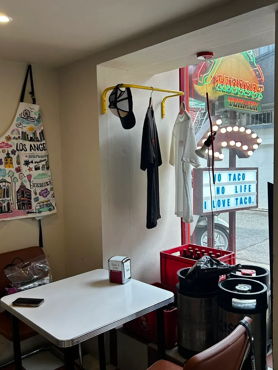 Taco Dot interior tables and coat hooks
