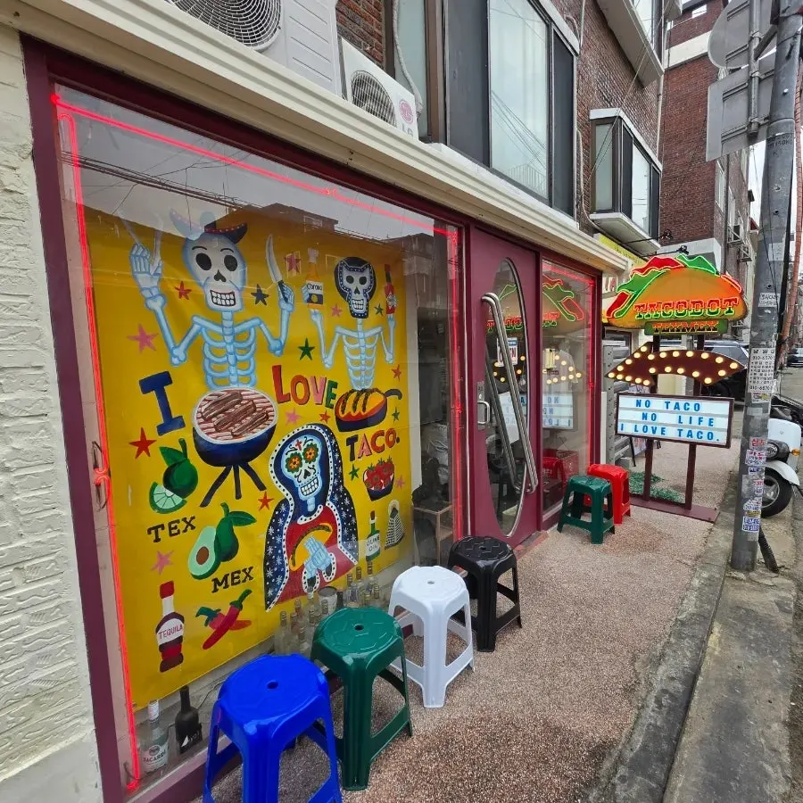 Street view with Taco Dot Mangwon Market Main Branch sign
