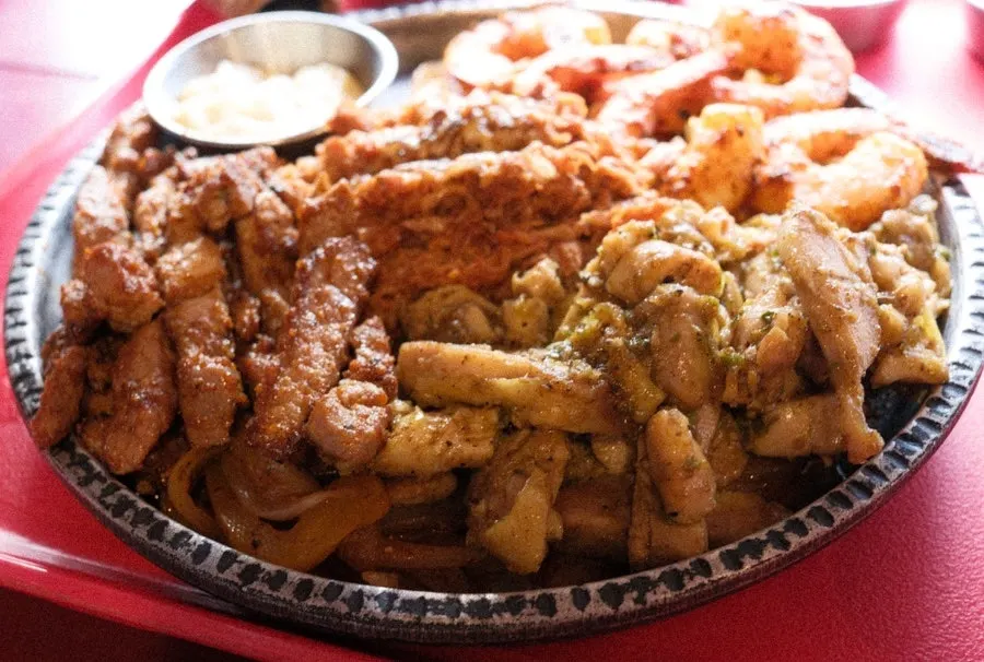 Pulled pork, chicken, shrimp and carnitas on the platter