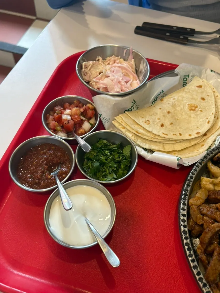 Taco Dot's house-made sauce and fajita ingredients