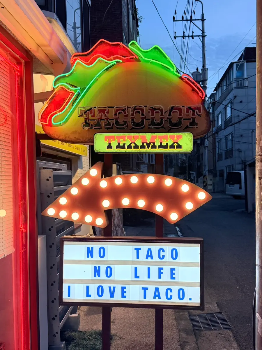 Taco Dot's exterior neon sign