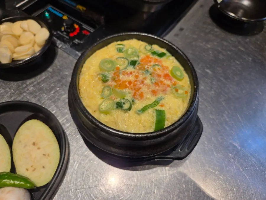 Flat mandu and bibim jjolmyeon side dishes