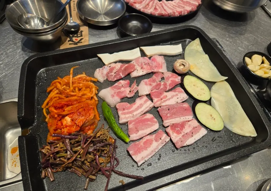 Kimchi jjigae simmered in pork rib broth
