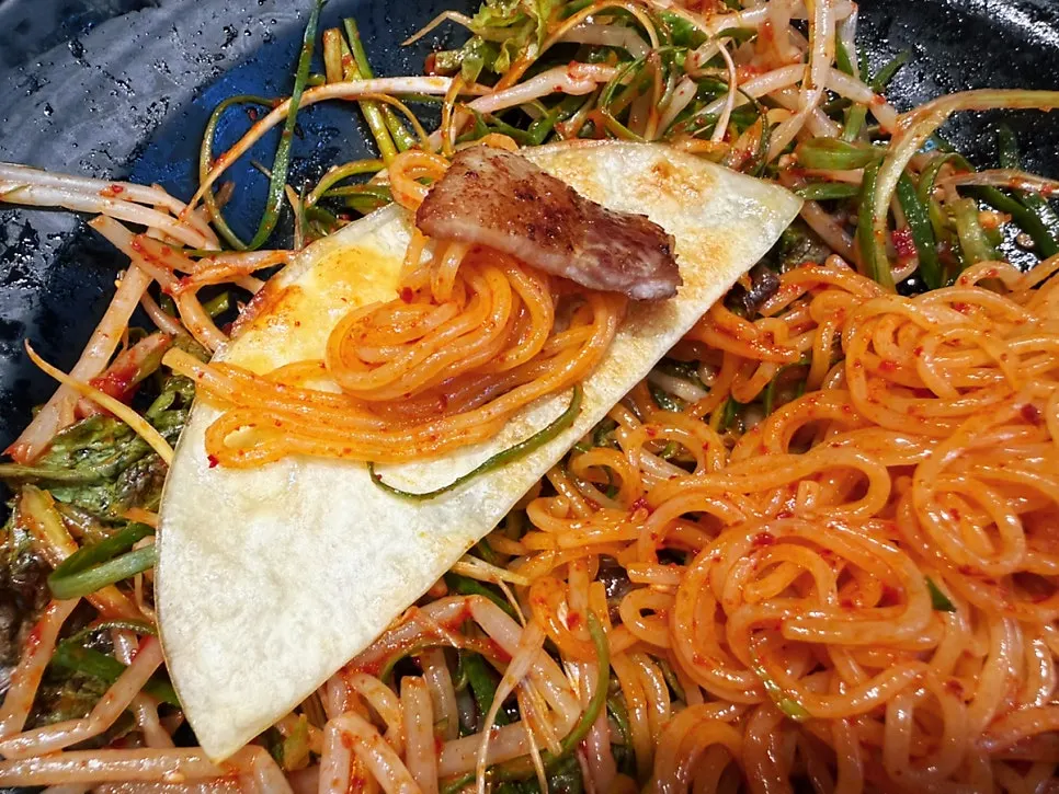 Meat wrapped with Seomun Market flat dumplings