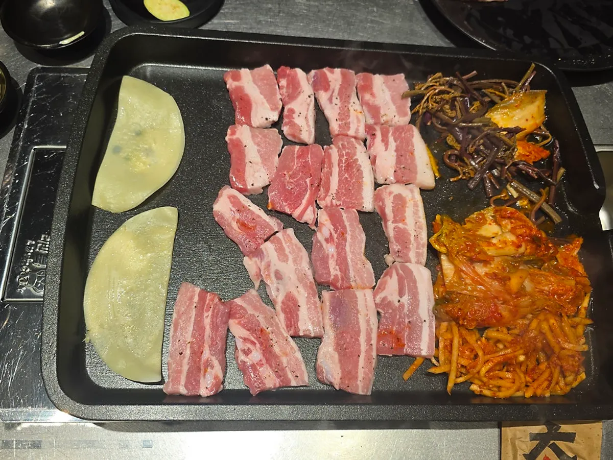 Signature spread of pork at Taedon Geomdan Sageori Branch