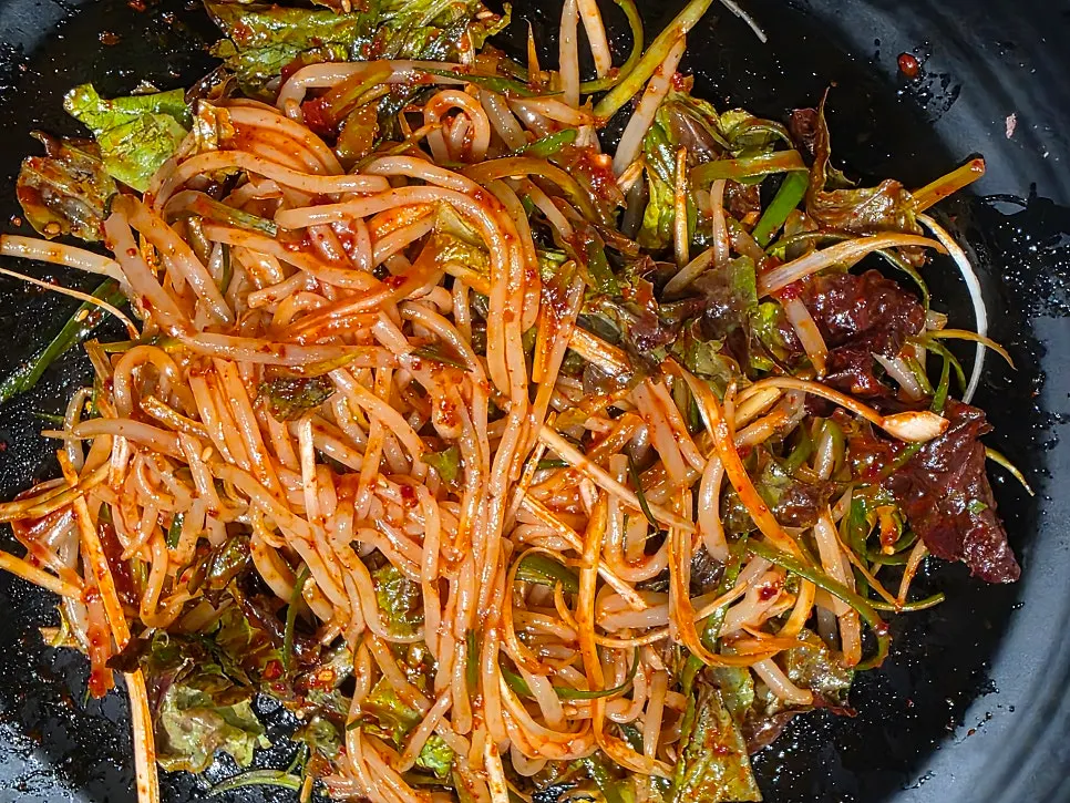 Mixed jjolmyeon noodles from the free side dishes