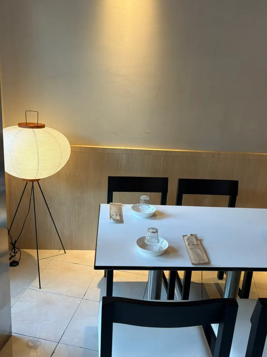 Interior of Taegyeongok with hanok-style gat lampshades
