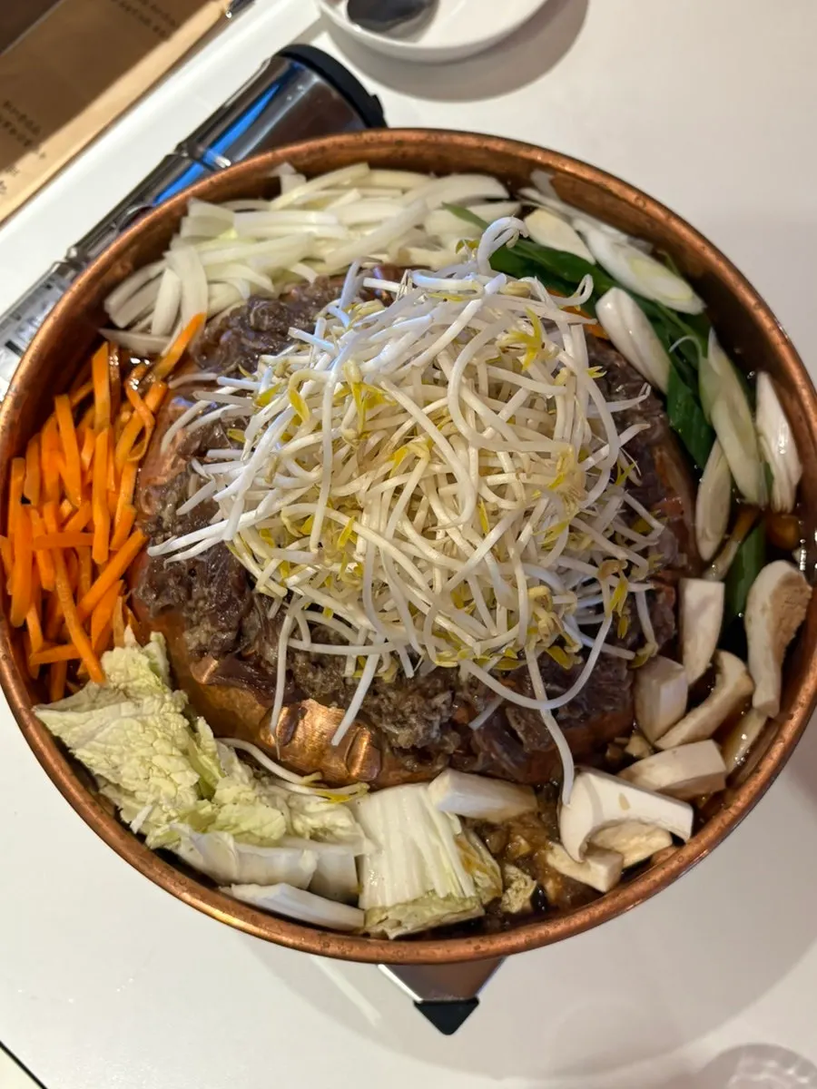 Seoul-style bulgogi pan after vegetables have wilted down