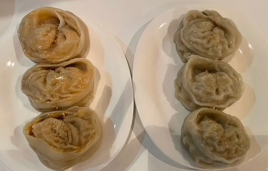 A plate of Taegyeongok's half-and-half dumplings