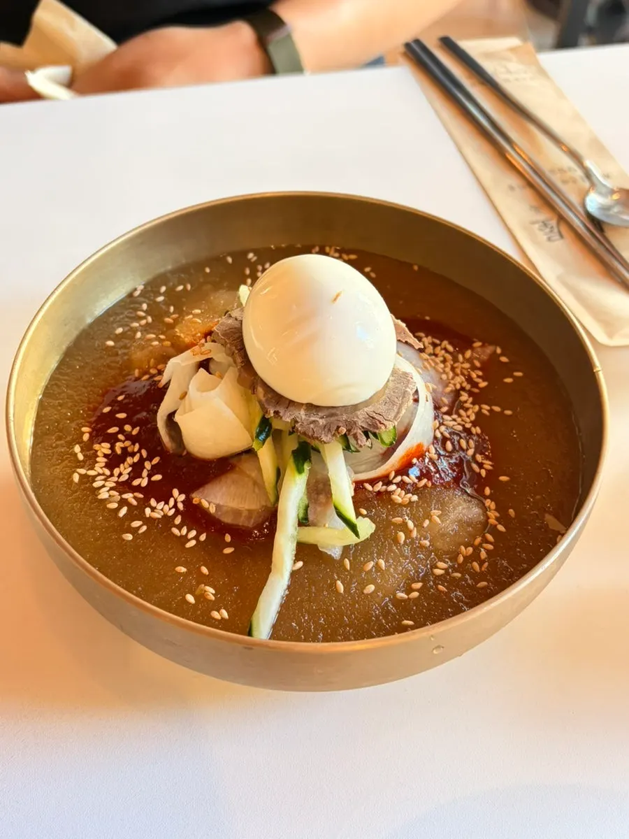 Vertical shot of the Hamheung mul-bibim naengmyeon at Taegyeongok