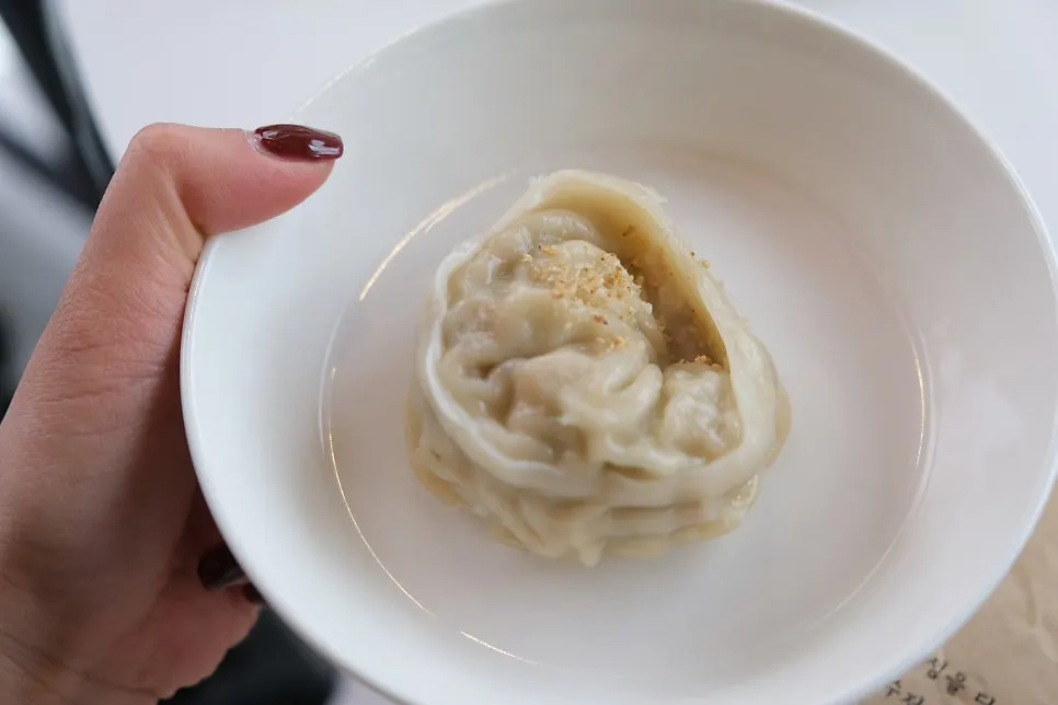 Cross-section of a Taegyeongok handmade dumpling showing the filling