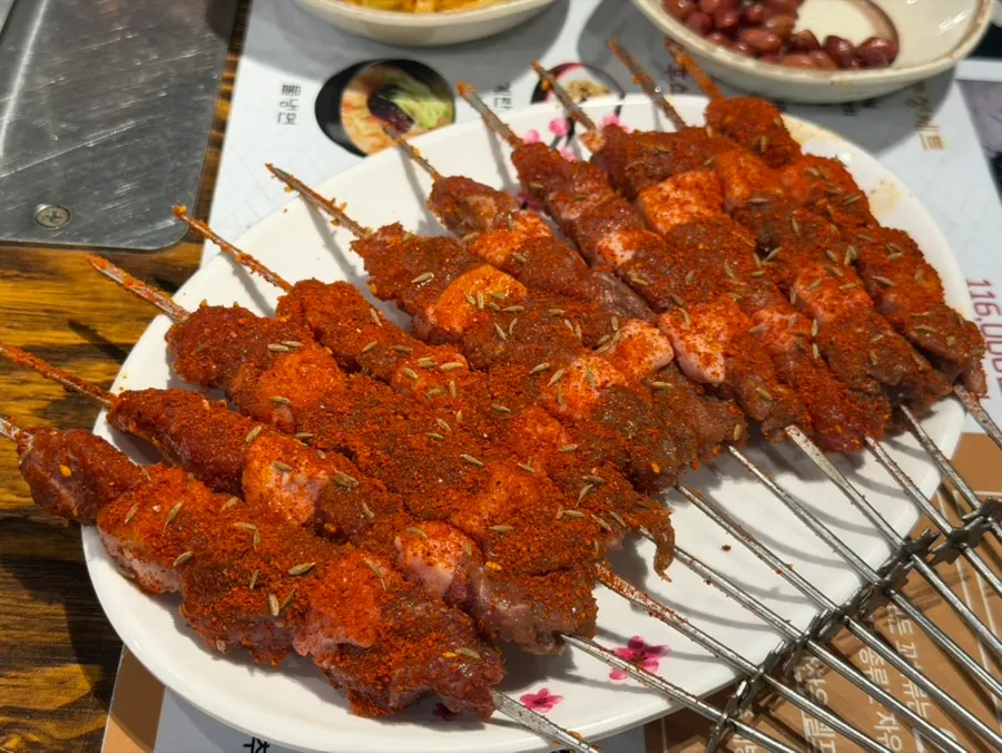Seasoned lamb skewers coated in red cumin seasoning