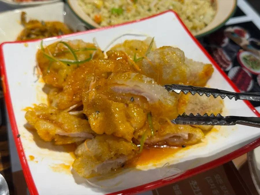 Close-up of crispy-outside, tender-inside guobaorou