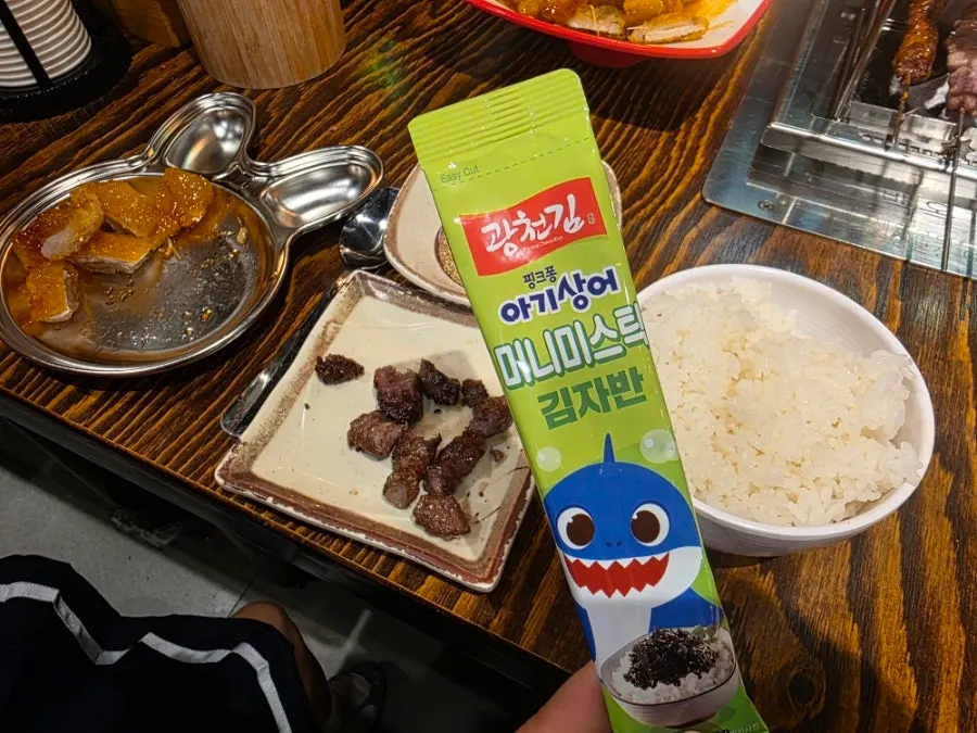 Table spread of fried rice and guobaorou