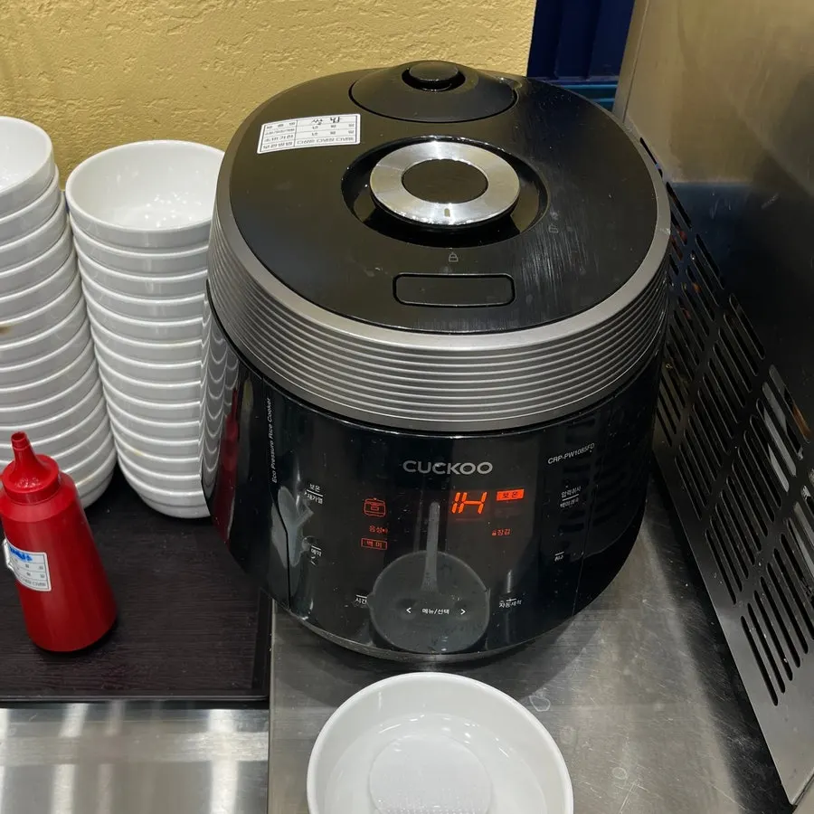 A bowl of barley rice scooped from the self-serve corner