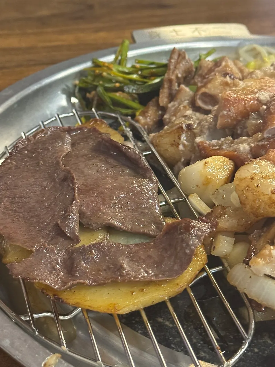 Assorted gopchang with bracken fern and bean sprouts