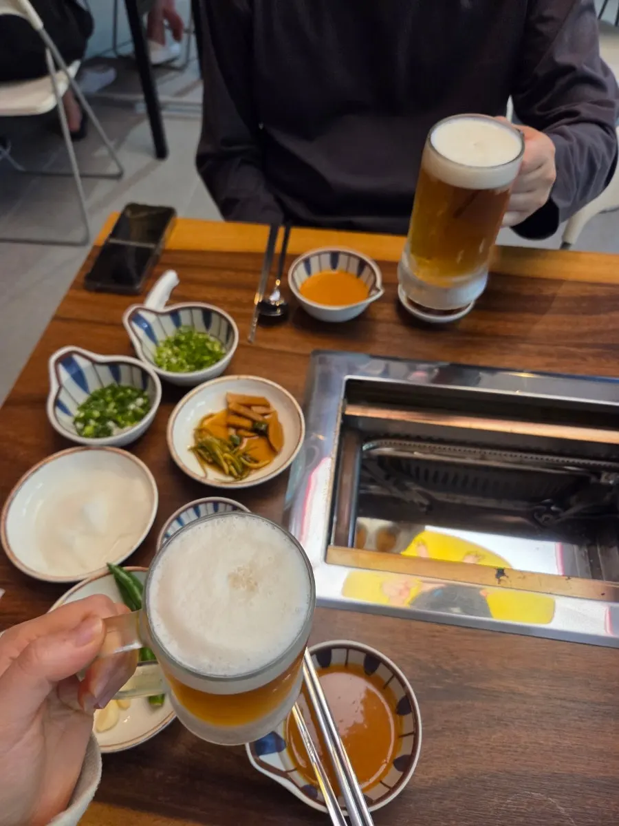 Complimentary odeng-tang and draft beer