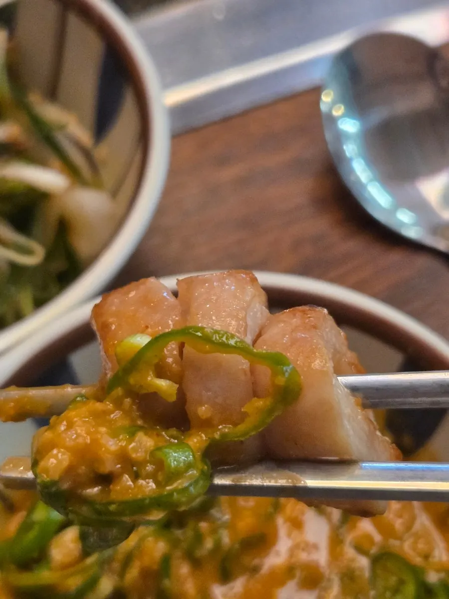 Close-up of raw makchang grilled crispy on the outside