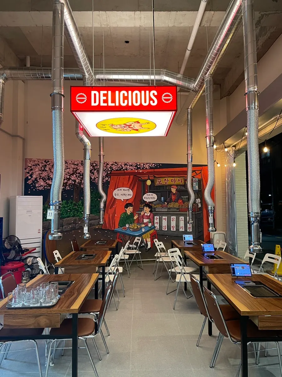 Interior of Taeyeong Saengmakchang decorated with paintings and lighting