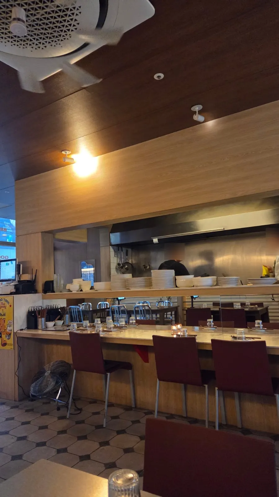 Interior view showing Thai Yami's open kitchen