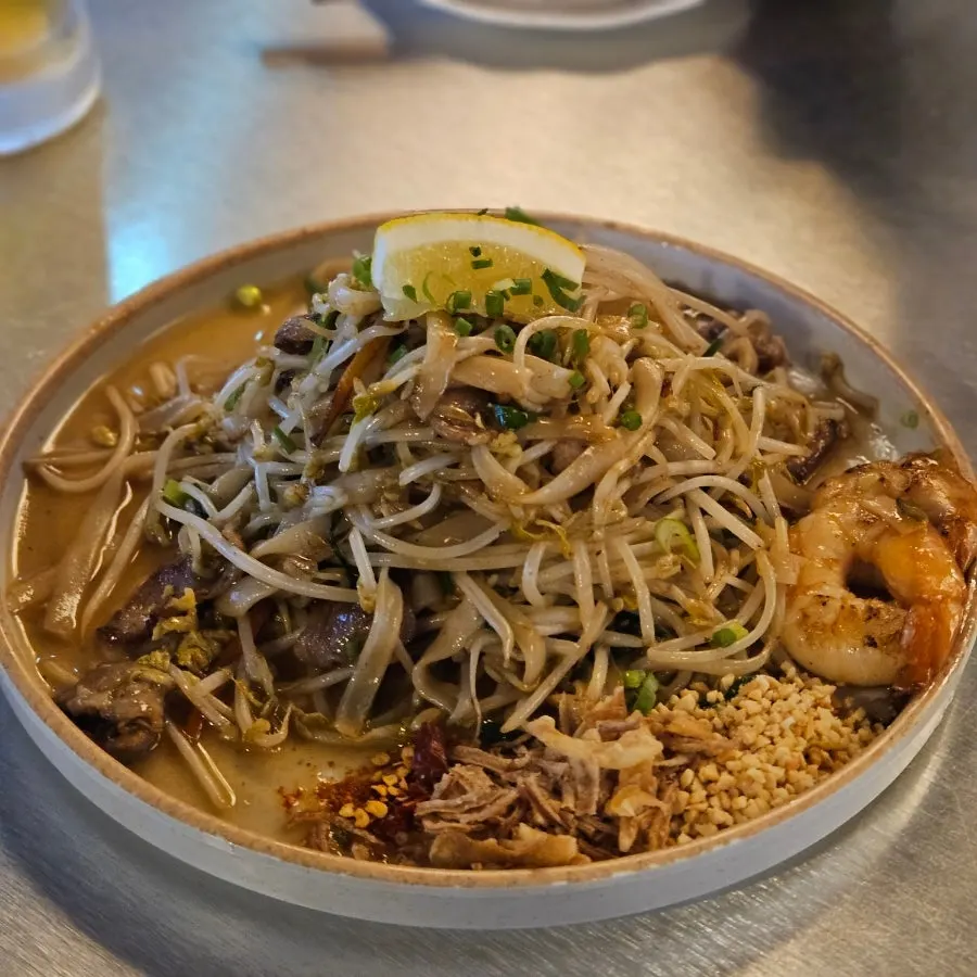 Thai Yami's pad thai topped with large shrimp