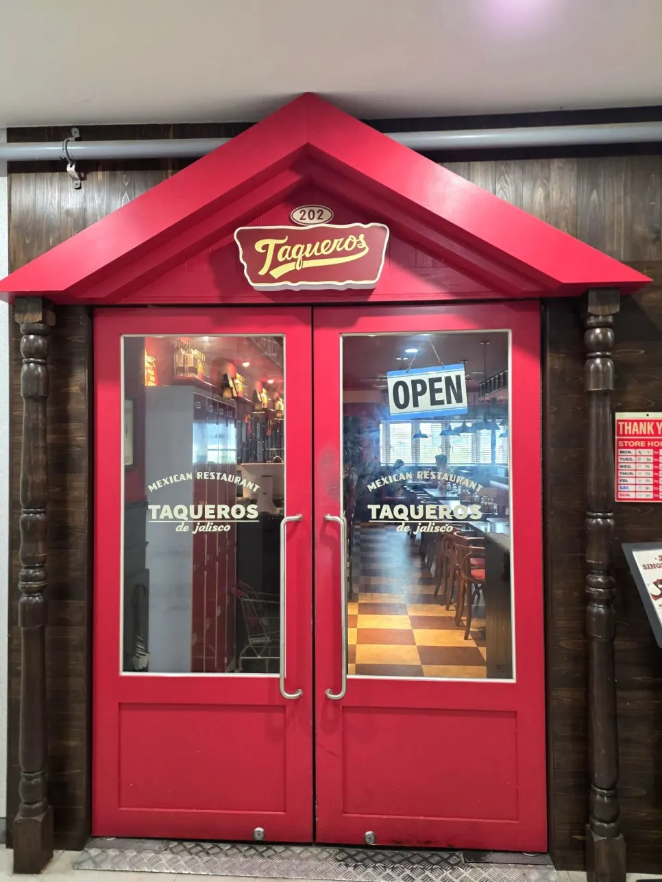 Entrance and Mexican-style interior of Taqueros Magok Main Branch