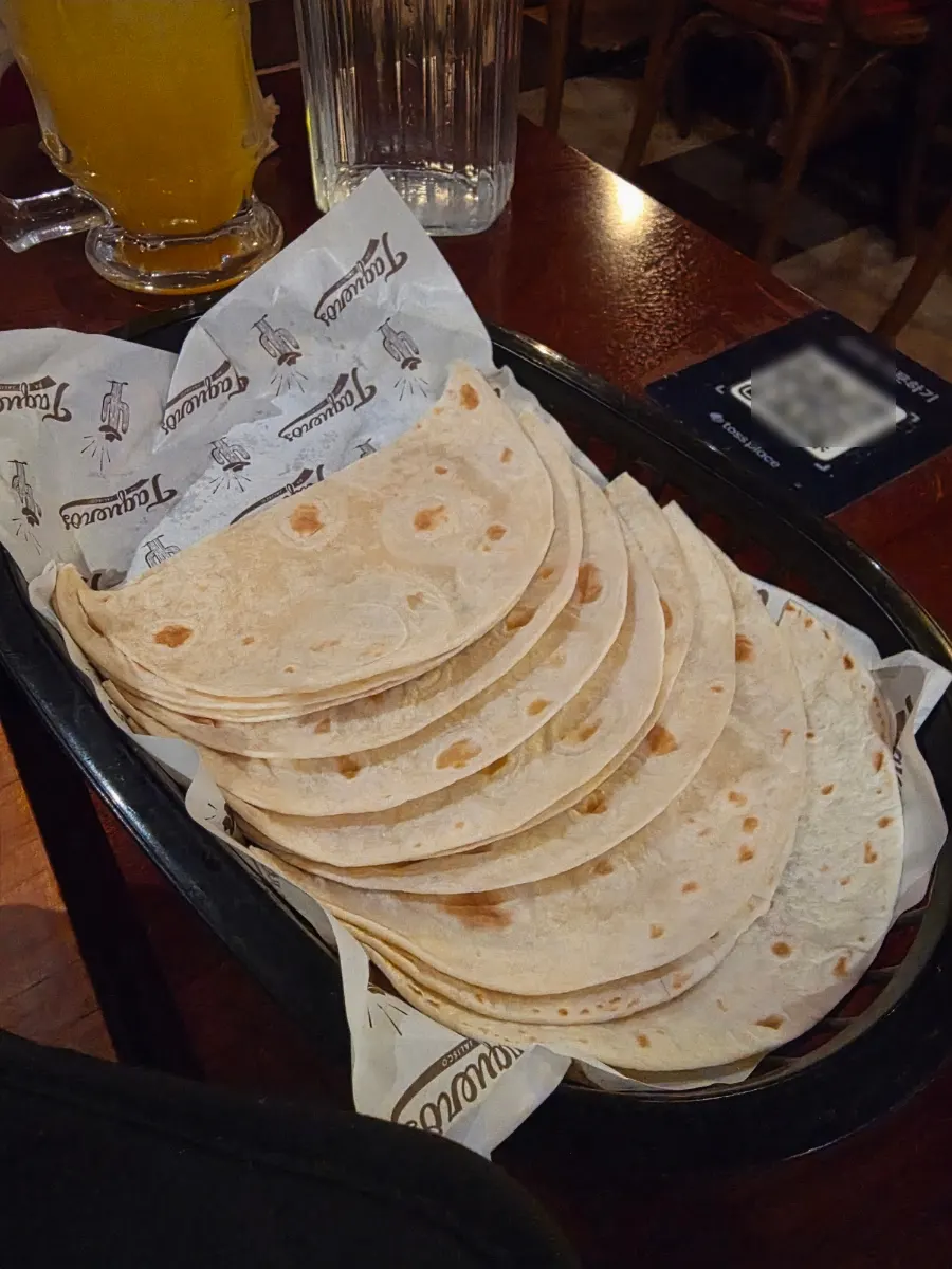 Plenty of tortillas provided with leftover fajita