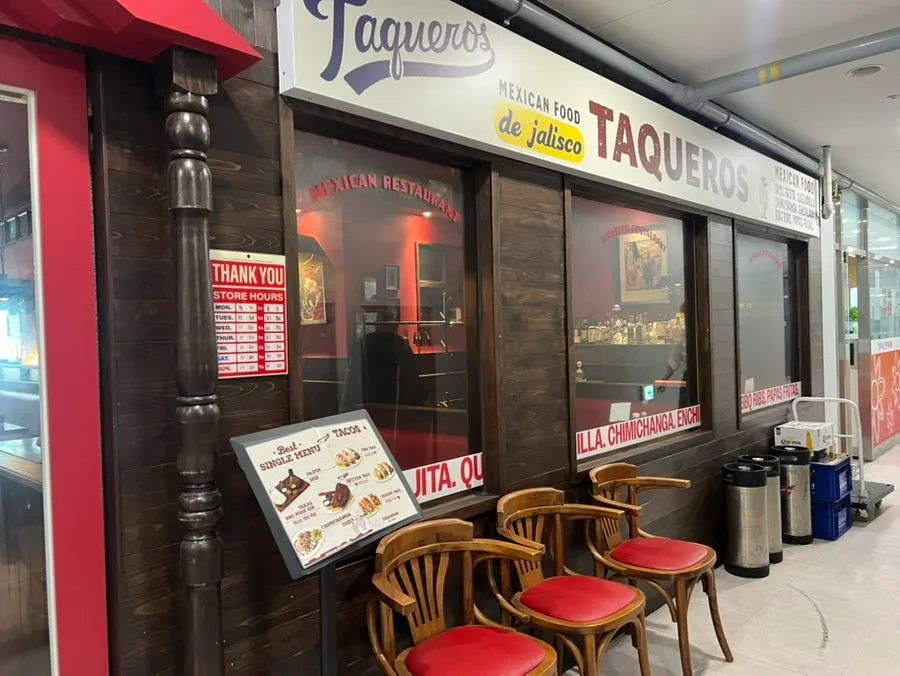 Entrance and waiting chairs at Taqueros Magok