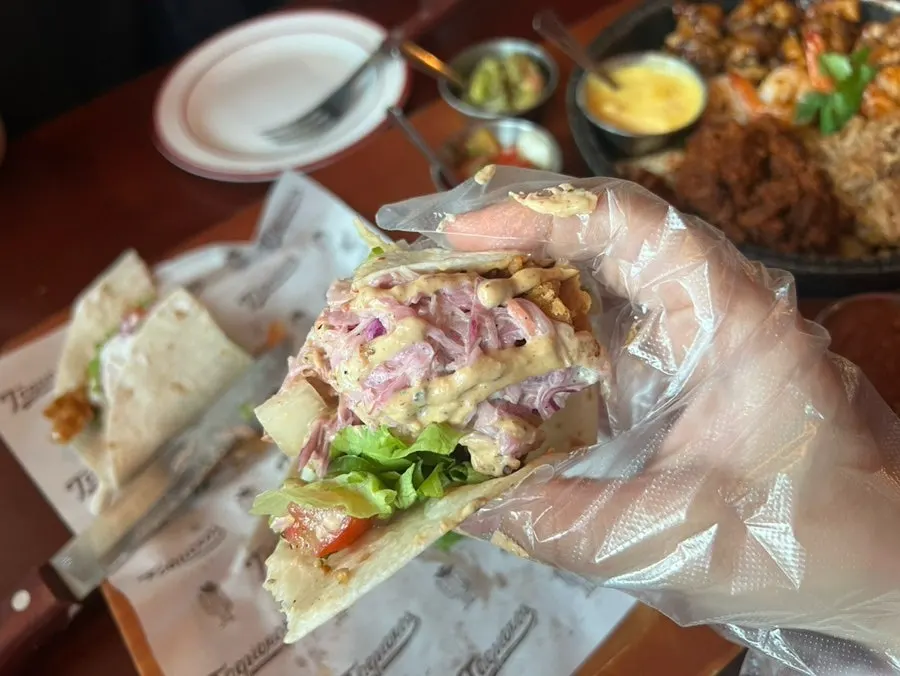 Fish taco and chicken taco cut in half