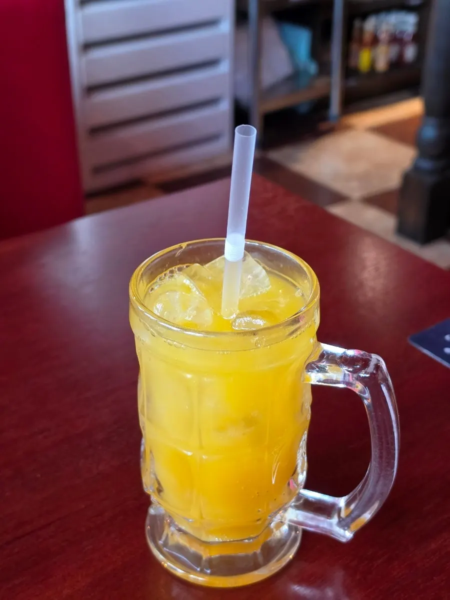 The apple mango ade we added to the order